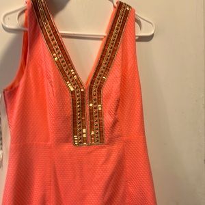 Lilly Pulitzer bright orange with gold accents